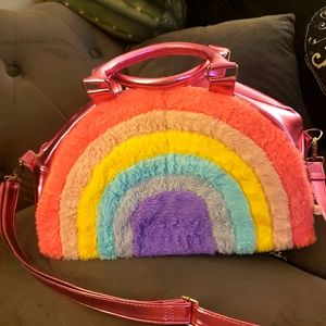 Large rainbow bag with spikes and furry side.